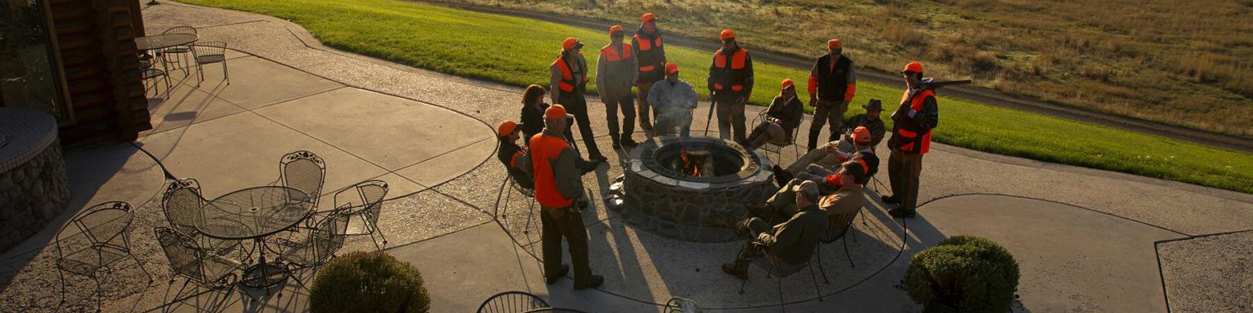 Gathering around the firepit at the lodge