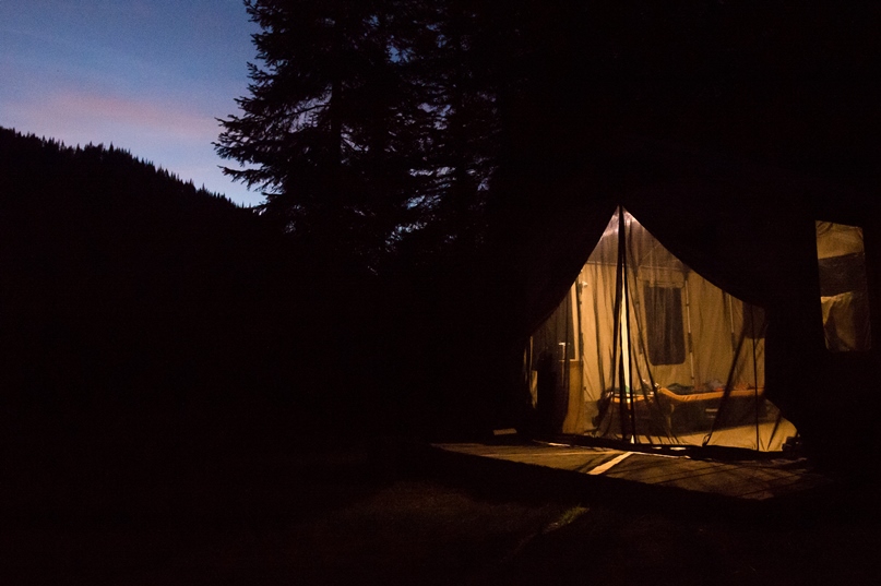 wall tent at night trout camp