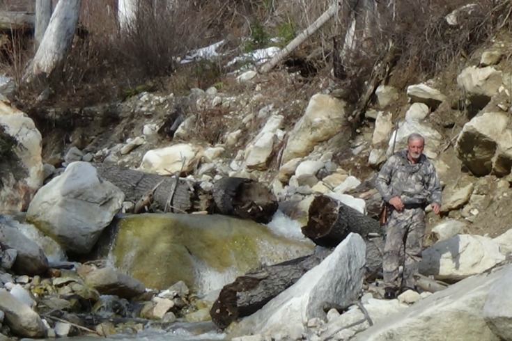 Joe navigating around the big boulders back to camp down Pinchot Creek.