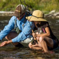 Father and Daughter with caught fish