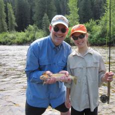 Father and Daughter with caught fish