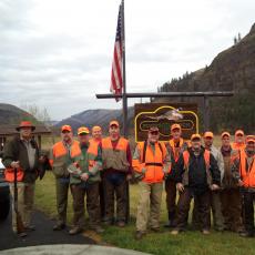 wingshooting group in front of canyon