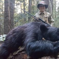 black bear with youth