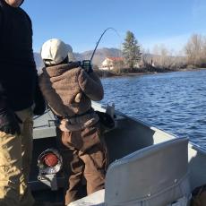 young angler with fish on